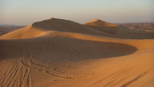 Scenic view of desert against sky