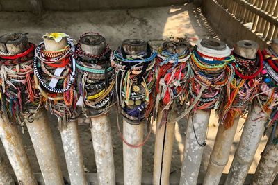 Close-up of multi colored bracelets in bamboo