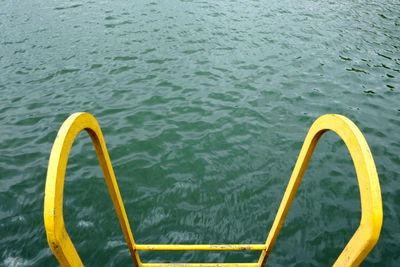 High angle view of ladder in lake