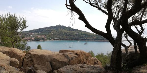 Scenic view of bay against sky