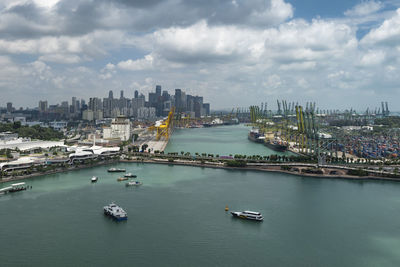 High angle view of cityscape with harbor at waterfront