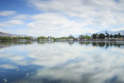 Scenic reflection of clouds in calm lake