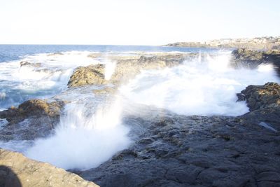 Scenic view of sea against clear sky