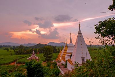 Panoramic view of buildings against sky during sunset