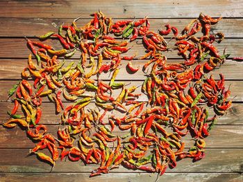 High angle view of red chili peppers on table