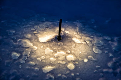 High angle view of illuminated lights in water