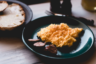 High angle view of breakfast served in plate on table