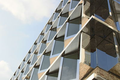 Low angle view of modern building against sky