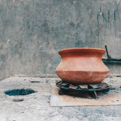 Old cooking pot on table