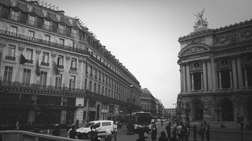 People in front of building