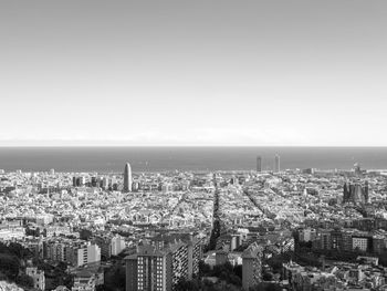 High angle view of city buildings against sky