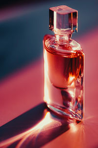 Close-up of glass bottle on table