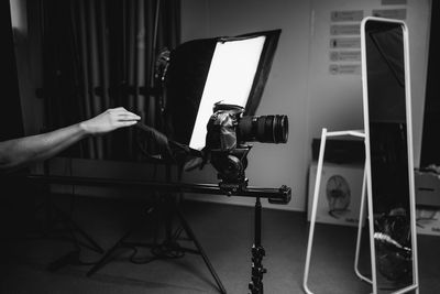 Man photographing working on stage