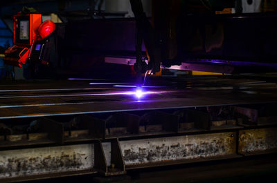 Blurred motion of illuminated working at night