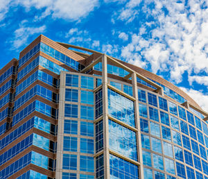 Low angle view of modern building against sky
