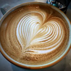 High angle view of cappuccino on table