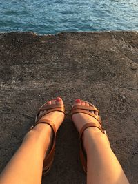 Low section of woman on beach