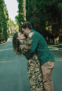 Couple romancing on road