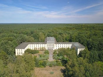 Built structure on landscape against sky