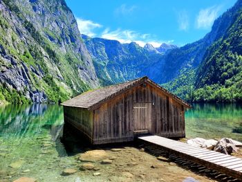 Scenic view of sea and mountains against sky - obersee - berchtesgaden 