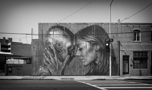 Digital composite image of people on building against sky