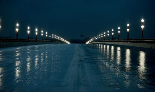 Illuminated street lights at night
