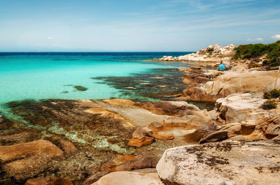 Scenic view of sea against blue sky