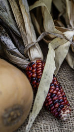 Red corn on table
