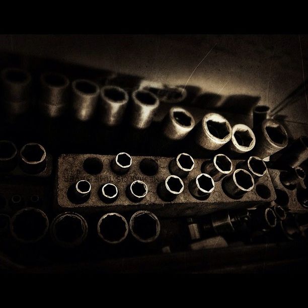 indoors, still life, close-up, in a row, large group of objects, metal, order, music, arts culture and entertainment, equipment, arrangement, no people, studio shot, technology, table, repetition, old-fashioned, man made object, metallic, musical instrument