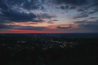 High angle view of buildings against sky at sunset