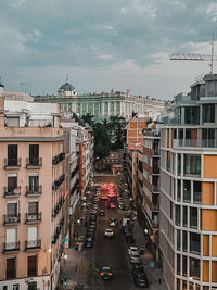 High angle view of buildings in city against sky