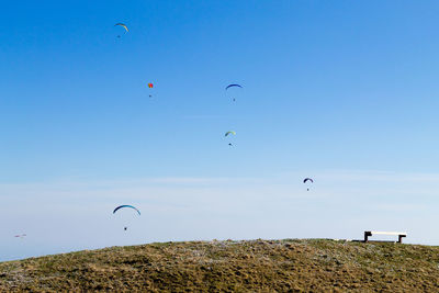 Low angle view of kite flying in sky