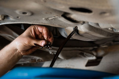 Cropped image of man working in workshop