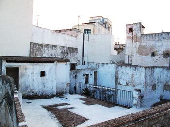 Old buildings against blue sky