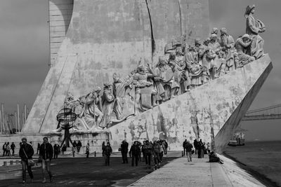 People at padrao dos descobrimentos by tagus river