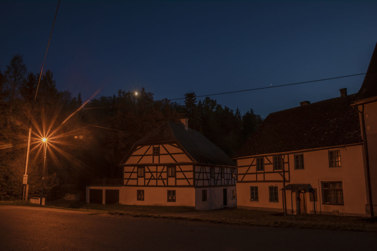 ILLUMINATED BUILDING AT NIGHT