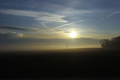Scenic view of silhouette landscape against sky during sunset
