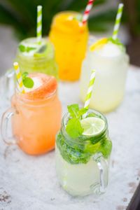 Close-up of drinks served on table