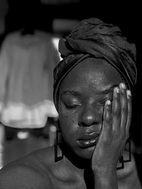 Close-up of young woman wearing headscarf