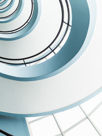 Low angle view of spiral staircase in building