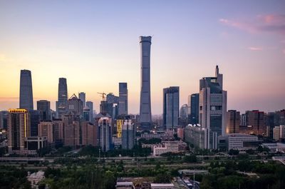 Buildings in city against sky