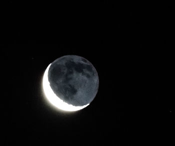 Low angle view of moon in sky