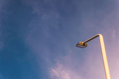 Low angle view of street light against sky