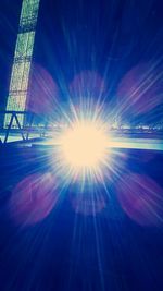 View of illuminated street light against sky