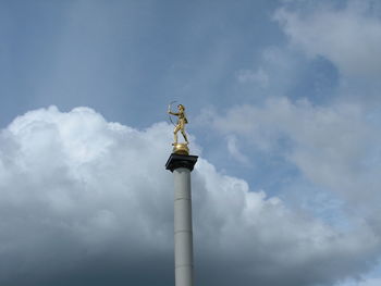 Low angle view of street light against sky