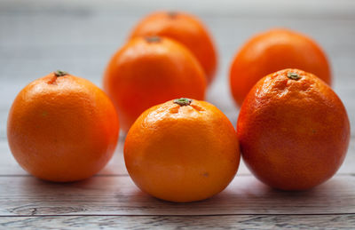 Close-up of orange fruits on table