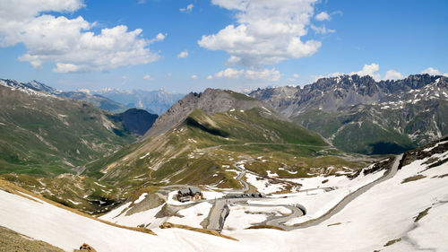 Scenic view of snowcapped mountains against sky