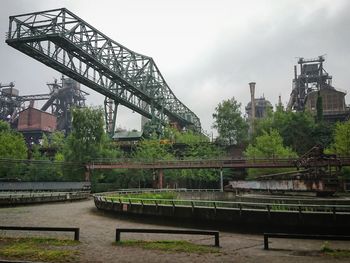 Bridge over river against sky