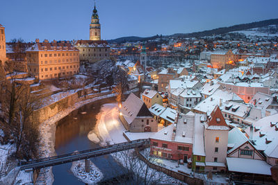 High angle view of illuminated buildings in city