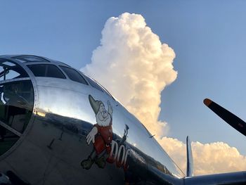 Low angle view of airplane against sky